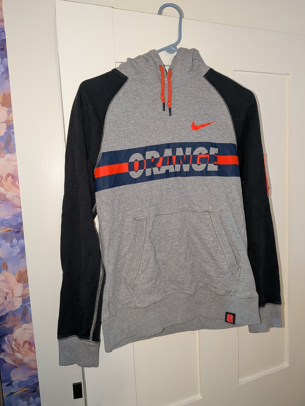 Nike Gray Pullover Hoodie with Black Sleeves and Orange Accents